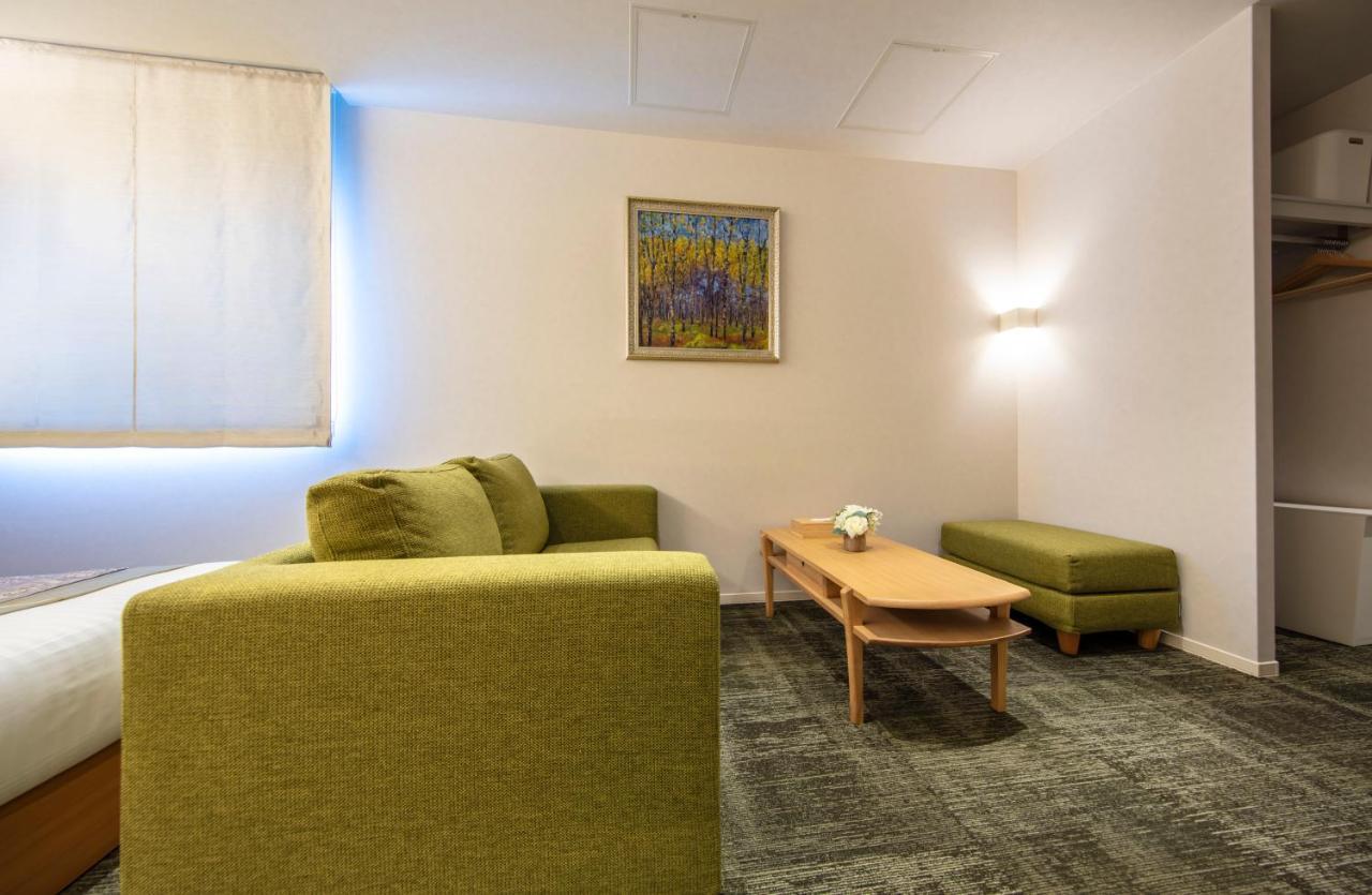 Grand Base Okayama Ekimae Aparthotel ภายนอก รูปภาพ