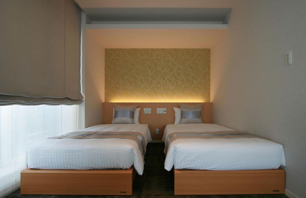 Grand Base Okayama Ekimae Aparthotel ภายนอก รูปภาพ