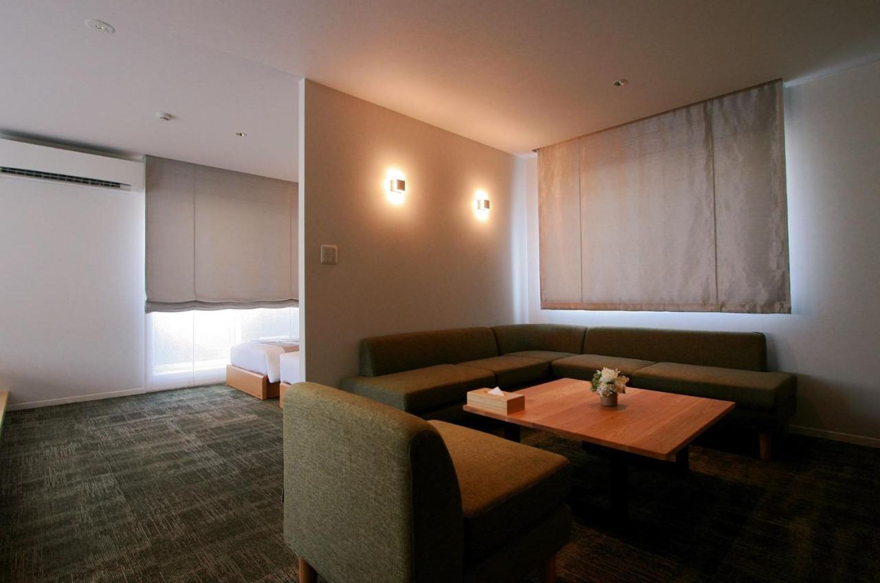 Grand Base Okayama Ekimae Aparthotel ภายนอก รูปภาพ