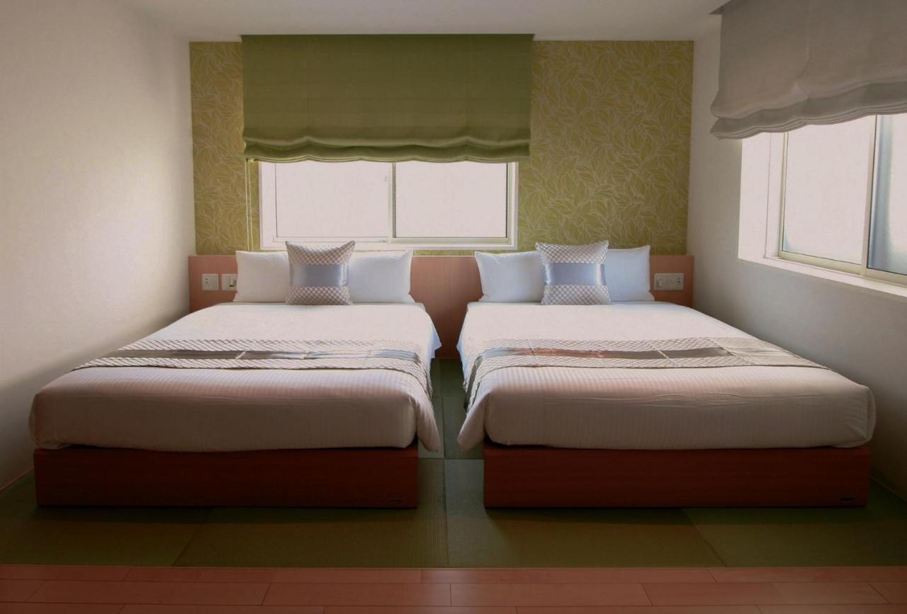 Grand Base Okayama Ekimae Aparthotel ภายนอก รูปภาพ