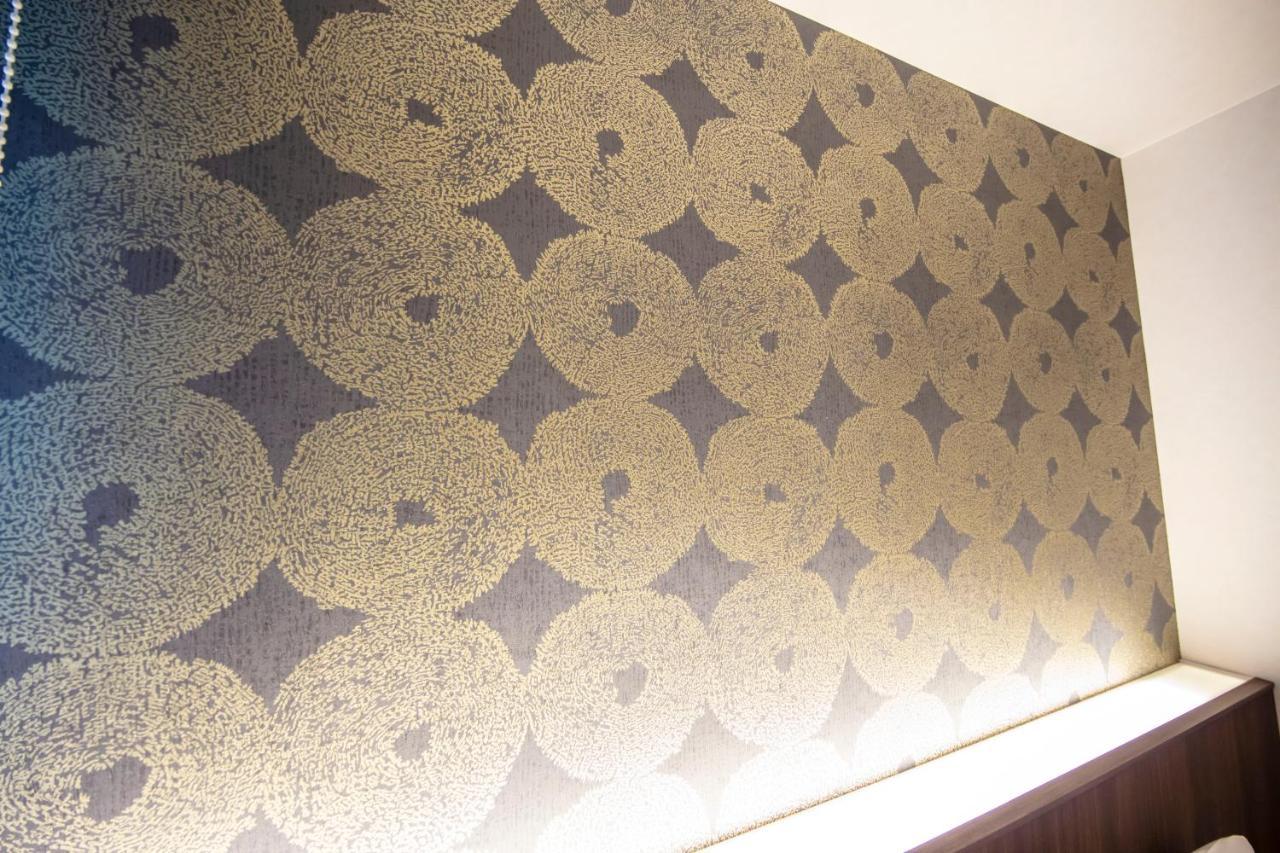 Grand Base Okayama Ekimae Aparthotel ภายนอก รูปภาพ