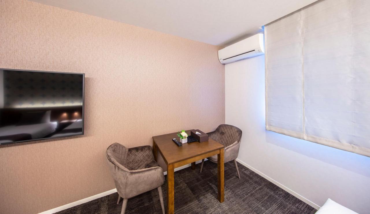 Grand Base Okayama Ekimae Aparthotel ภายนอก รูปภาพ