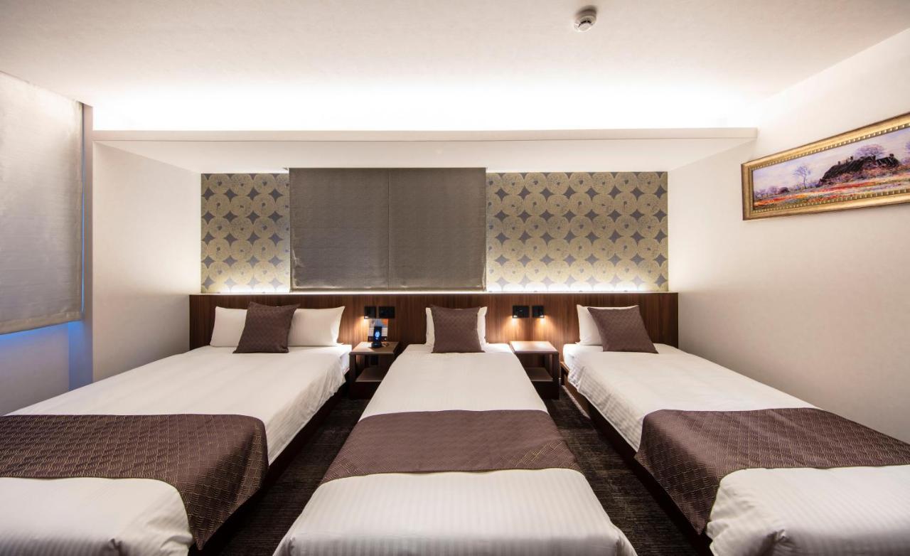 Grand Base Okayama Ekimae Aparthotel ภายนอก รูปภาพ