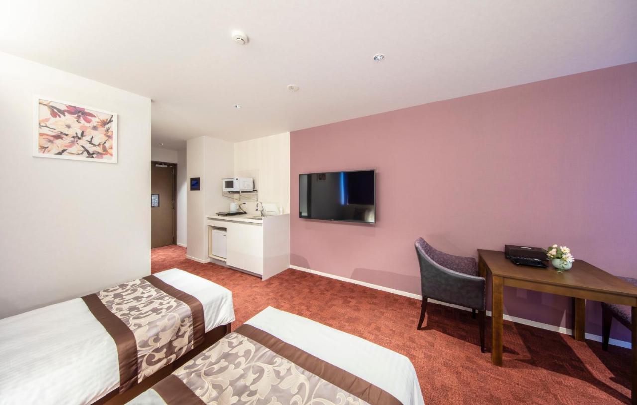 Grand Base Okayama Ekimae Aparthotel ภายนอก รูปภาพ