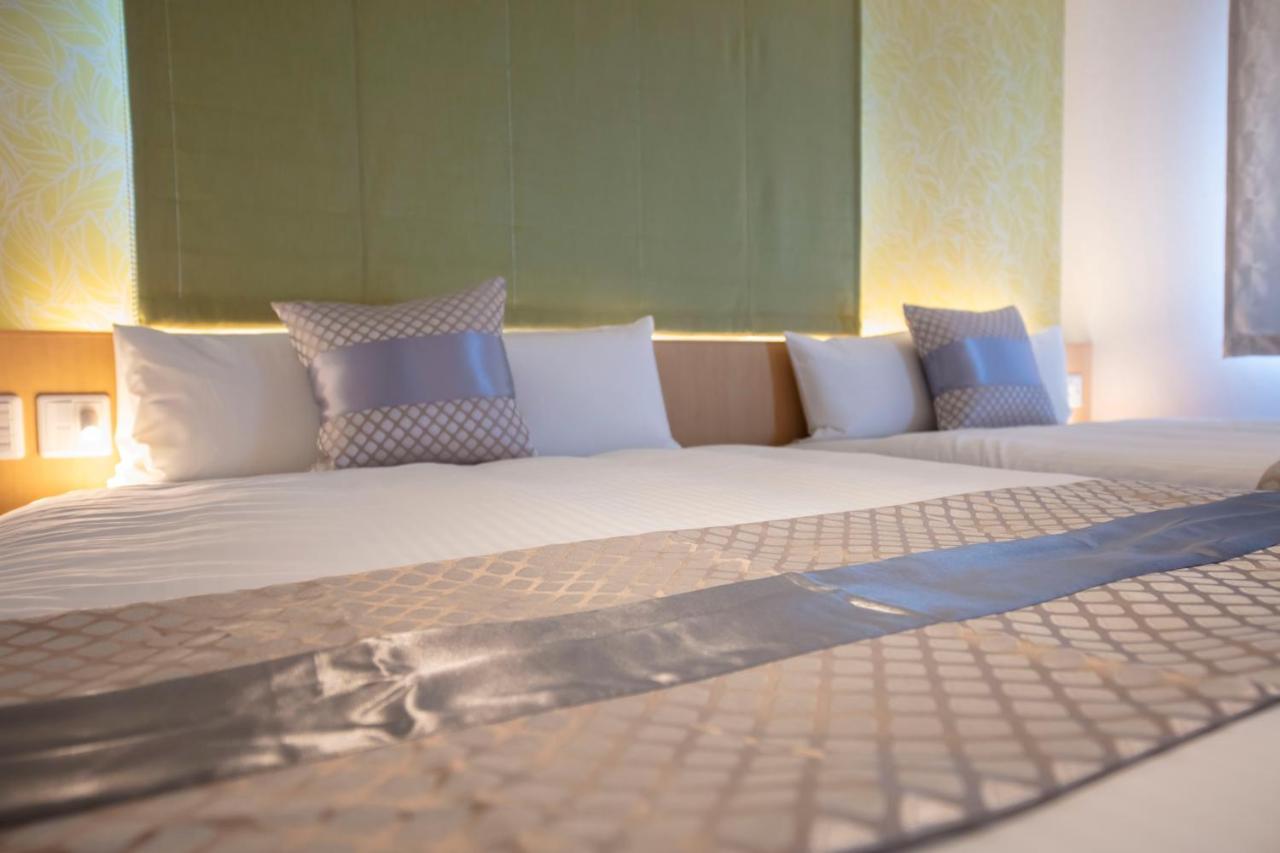 Grand Base Okayama Ekimae Aparthotel ภายนอก รูปภาพ