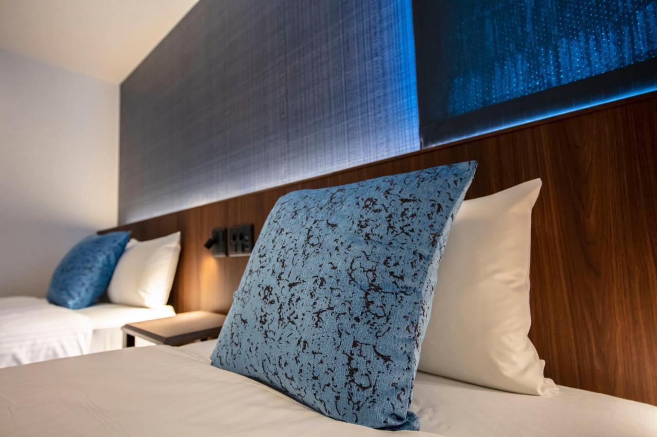 Grand Base Okayama Ekimae Aparthotel ภายนอก รูปภาพ