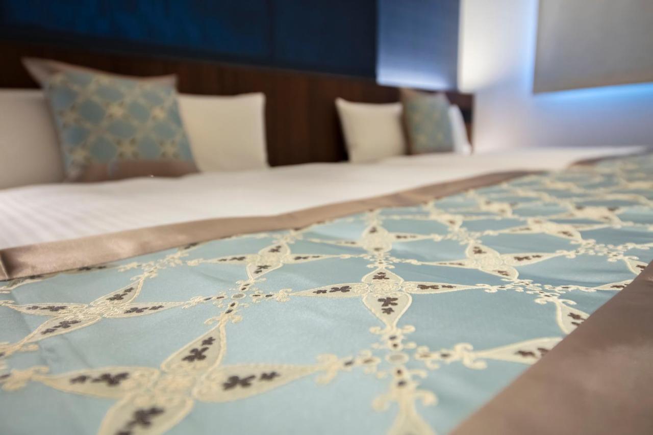 Grand Base Okayama Ekimae Aparthotel ภายนอก รูปภาพ