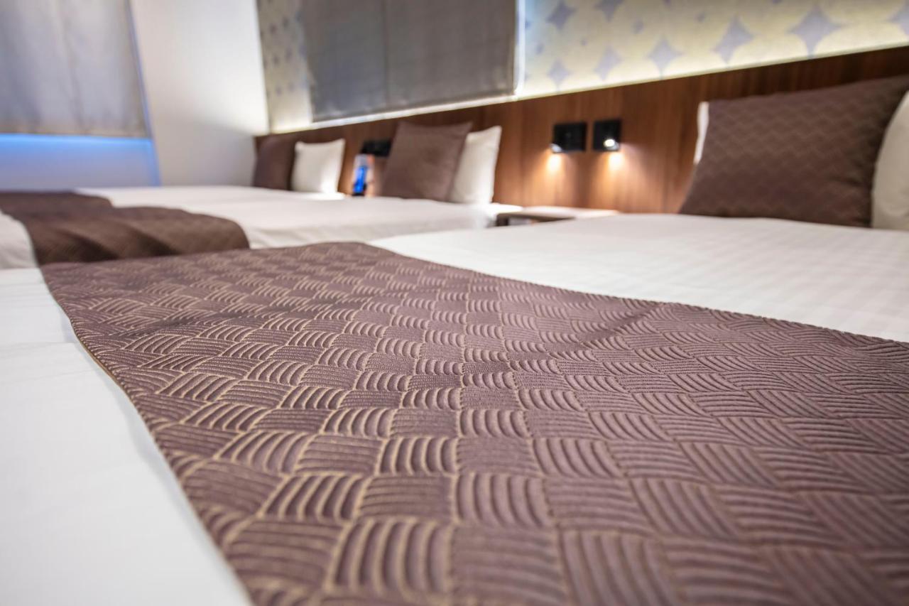 Grand Base Okayama Ekimae Aparthotel ภายนอก รูปภาพ