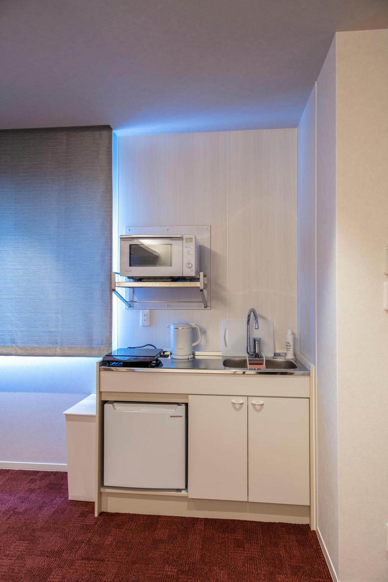 Grand Base Okayama Ekimae Aparthotel ภายนอก รูปภาพ